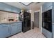 Kitchen with black appliances and ample cabinet space at 6356 Canyon Ridge Dr, Las Vegas, NV 89108