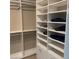 Spacious walk-in closet with hanging rods and shelves at 5301 Fairbranch Ln, Las Vegas, NV 89135