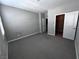 Bright bedroom with grey walls and carpet at 8537 W Oquendo Rd, Las Vegas, NV 89113