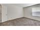 Spacious bedroom with neutral carpeting and ample natural light at 2451 N Rainbow Blvd # 1014, Las Vegas, NV 89108