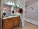 Bathroom with granite vanity and marble shower at 2451 Muirfield Ave, Henderson, NV 89074