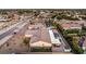 Aerial view of house, pool, and surrounding area at 8931 W Hammer Ln, Las Vegas, NV 89149