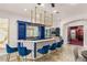 Stylish bar with blue cabinetry and gold accents at 5930 N El Capitan Way, Las Vegas, NV 89149