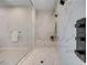 Spa-like shower with marble tile and built-in bench seating at 1458 Dragon Stone Pl, Henderson, NV 89012