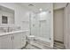 Updated bathroom with white vanity and a walk-in shower at 5187 Caliente St # 96, Las Vegas, NV 89119