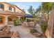 Outdoor patio with seating and a tranquil pond feature at 14 Corral De Tierra Pl, Henderson, NV 89052