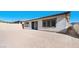 Large backyard with gravel and view of home's back elevation at 34 Barrio Alto Ct, Henderson, NV 89011