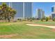 Sand trap and green on the golf course with high-rise buildings behind at 639 Oakmont Ave # 3908, Las Vegas, NV 89109