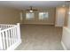 Spacious bonus room with carpeted floors and ceiling fan at 92 Laying Up Ct, Las Vegas, NV 89148