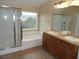 Bathroom with double sinks, soaking tub, and shower at 92 Laying Up Ct, Las Vegas, NV 89148