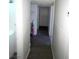 Clean hallway with light walls and carpeted flooring at 2100 Dogwood Ave, North Las Vegas, NV 89030