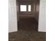 Clean hallway with carpeted floor leading to other rooms at 3608 Tundra Swan St, Las Vegas, NV 89122