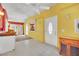 Bright sunroom with yellow walls and a tiled floor at 5290 Obannon Dr, Las Vegas, NV 89146