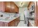 Modern kitchen with stainless steel appliances and granite countertops at 5330 E Charleston Blvd # 2, Las Vegas, NV 89142