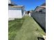 Landscaped backyard with artificial turf at 2932 Demetrius Ave, Las Vegas, NV 89101