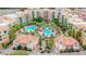 Aerial view showing resort-style pools and multiple residential buildings at 30 Strada Di Villaggio # 204, Henderson, NV 89011