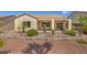 Backyard view of the house with covered patio at 2119 Lewiston Pl, Henderson, NV 89044