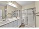 Bathroom with double sinks, large shower, and updated fixtures at 2119 Lewiston Pl, Henderson, NV 89044