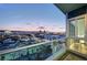 Balcony offers stunning panoramic city views at dusk at 4525 Dean Martin Dr # 1208, Las Vegas, NV 89103