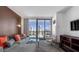 Spacious living room with city views and modern decor at 4381 W Flamingo Rd # 20320, Las Vegas, NV 89103