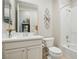 Clean bathroom with a bathtub and modern vanity at 10057 Regency Canyon Way, Las Vegas, NV 89148