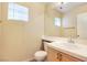 Clean bathroom with single vanity and tile flooring at 5051 Jacarilla Ln, North Las Vegas, NV 89031