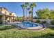 Relaxing kidney shaped pool and spa in a sunny backyard at 1002 Prestige Meadows Pl, Henderson, NV 89052