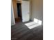 Well-lit bedroom with carpet and access to hallway at 3337 Autumn Veil St, Las Vegas, NV 89129