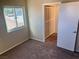 Bright bedroom with carpet flooring and a spacious closet at 3337 Autumn Veil St, Las Vegas, NV 89129