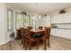 Bright dining area with a large table and chairs at 6391 Tempting Choice Ave, Las Vegas, NV 89131