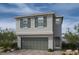 Two-story house with gray siding, a green garage door, and a front porch at 7086 Parkallen Ave, Las Vegas, NV 89113