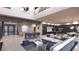 Open concept great room with modern kitchen and bar at 12 Oakmont Hills Ln, Las Vegas, NV 89141