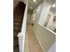 Upstairs hallway with carpeted flooring and access to bedrooms at 6709 Brick House Ave, Las Vegas, NV 89122