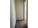 Simple hallway with carpeted floor and neutral walls at 9161 Dutch Oven Ct, Las Vegas, NV 89178