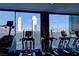 Modern gym with city views and a variety of equipment at 4381 W Flamingo Rd # 1809, Las Vegas, NV 89103