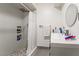 Updated bathroom with a vanity, shower, and white subway tile at 1300 Oak Tree Ln, Las Vegas, NV 89108