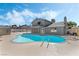 Refreshing kidney-shaped pool with spa and large backyard patio at 1300 Oak Tree Ln, Las Vegas, NV 89108