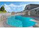 Relaxing kidney-shaped pool with spa and patio, great for entertaining at 1300 Oak Tree Ln, Las Vegas, NV 89108