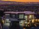 Modern luxury home with stunning city views at night at 25 Rockstream Dr, Henderson, NV 89012