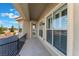 Covered balcony with access to exterior door and view at 6004 Chessington Ave, Las Vegas, NV 89131