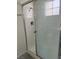 Shower stall with sliding glass doors and tiled walls at 1909 Villa Palms Ct # 109, Las Vegas, NV 89128