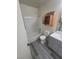 Updated bathroom with modern vanity and bathtub at 3805 Twig Ln, Las Vegas, NV 89108