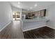 Kitchen with island and view into living area at 2633 Romanesque Queen St, Henderson, NV 89044