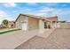 Single story home with attached garage and covered entry at 4454 Honeydew Cir, Las Vegas, NV 89147