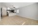 Dining area with tile floor and kitchen access at 6608 Trout Peak Way, Las Vegas, NV 89156