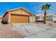 Tan one-story house with brown garage door and palm tree at 6608 Trout Peak Way, Las Vegas, NV 89156