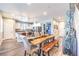 Elegant dining room with a live-edge table and modern chairs at 976 Via Panfilo Ave # 0, Henderson, NV 89011