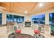 Outdoor kitchen with stainless steel appliances and a fireplace at 2349 Villandry Ct, Henderson, NV 89074