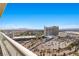 Spectacular view overlooking a city landscape, showcasing mountains and a large hotel at 2877 Paradise Rd # 304, Las Vegas, NV 89109