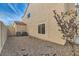 Side yard with gravel and AC units at 23 Antero Dr, Henderson, NV 89074